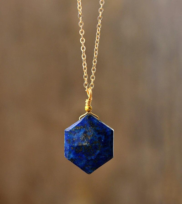 Women's Lapis Lazuli hexagon necklace. Deep blue gemstone pendant for elegant, boho style.