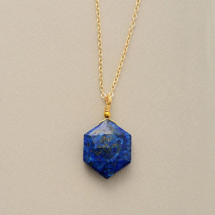 Spiritual Lapis Lazuli hexagon necklace for women. Healing crystal gemstone jewelry promoting intuition.