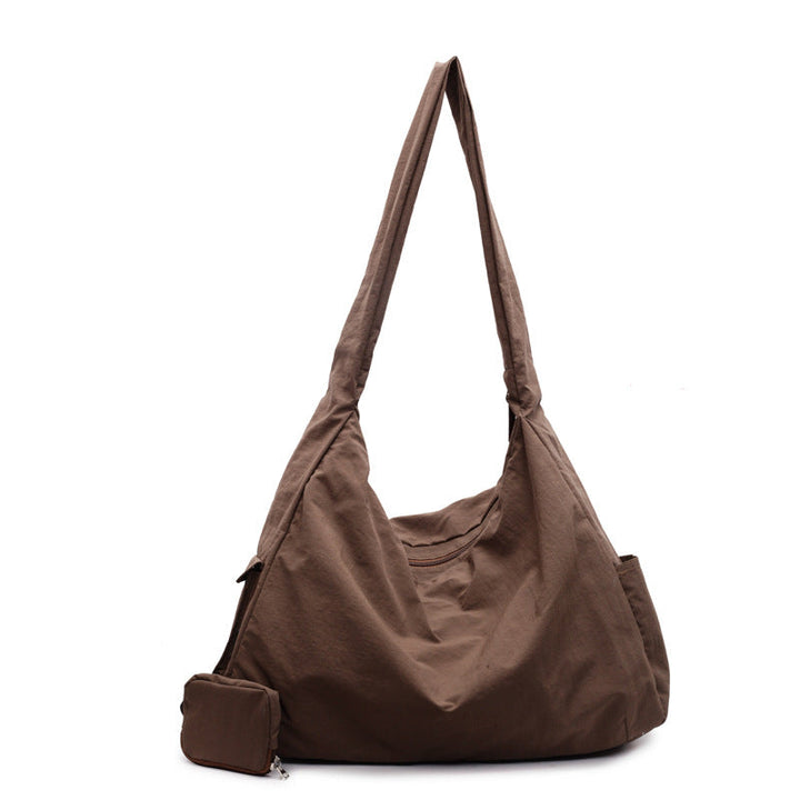 Fashionable women's crossbody bag, large capacity for everyday and travel style.