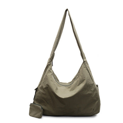 Durable women's everyday crossbody bag, large capacity, stylish & convenient.