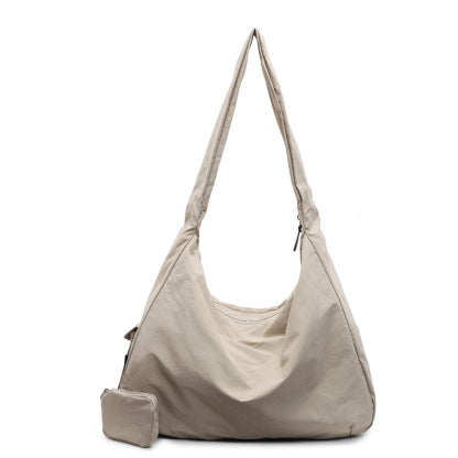 Versatile women's shoulder bag, large capacity for travel & daily essentials.