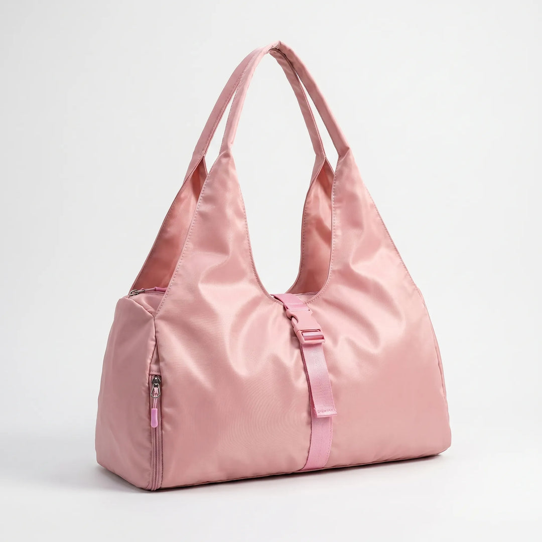 Spacious women's fitness bag, a large capacity duffel or shoulder bag for gym, yoga, and travel accessories.