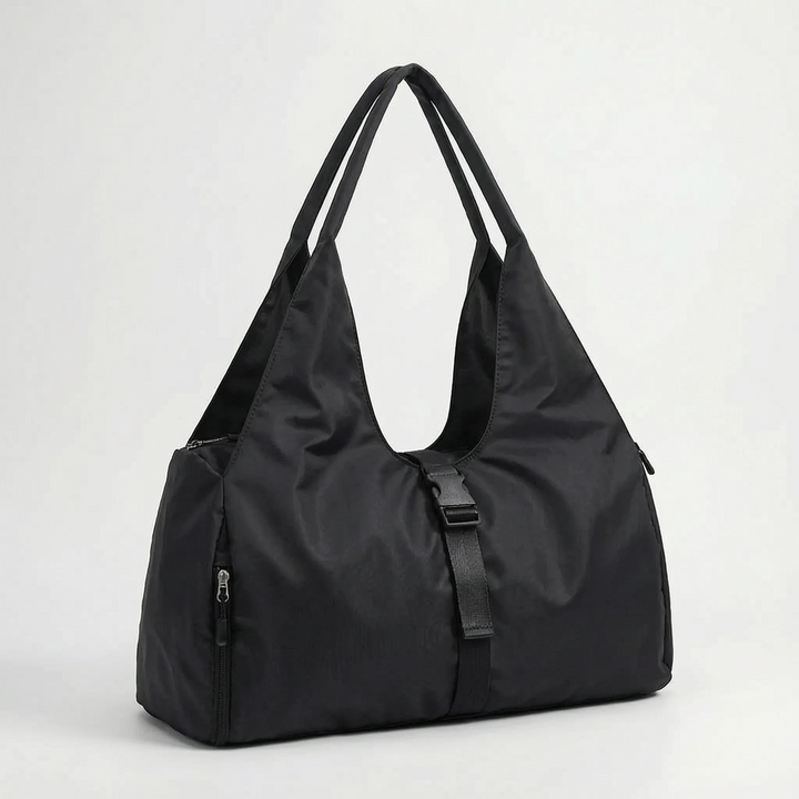 Durable women's large capacity gym duffel bag, perfect as a shoulder bag or sports tote for all your active needs.