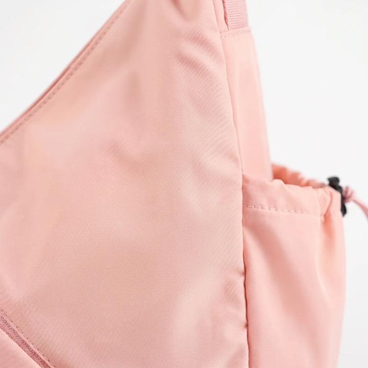 Spacious women's workout bag, a large athletic tote for gym gear & daily essentials with yoga mat holder.