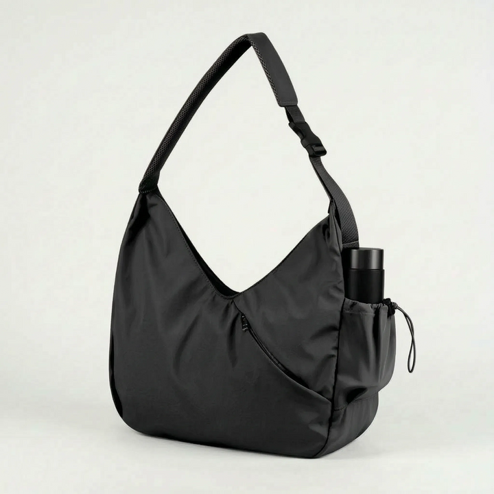 Versatile women's sport bag. Large polyester fitness tote with integrated yoga mat straps for active women.