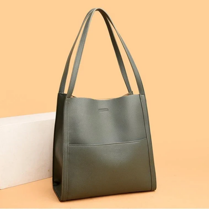 Stylish women's leather tote shoulder bag with large capacity, perfect for work or everyday carry.