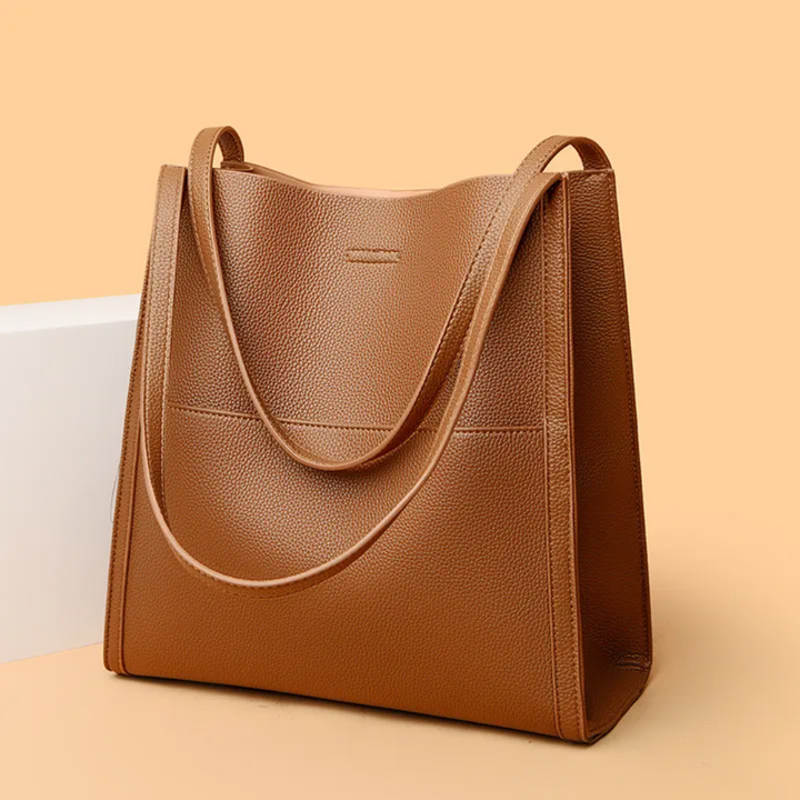 DailyLux women's large leather tote, a spacious shoulder bag designed for style and everyday utility.