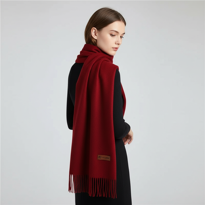 Stylish women's cashmere feel scarf in rich teal, a soft and warm fashion statement.