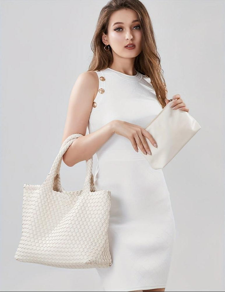 Sophisticated women's large woven tote bag, a spacious and elegant shoulder carryall.