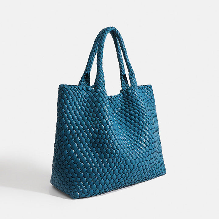 Elegant woven large tote bag for women, a spacious shoulder carryall for essentials.