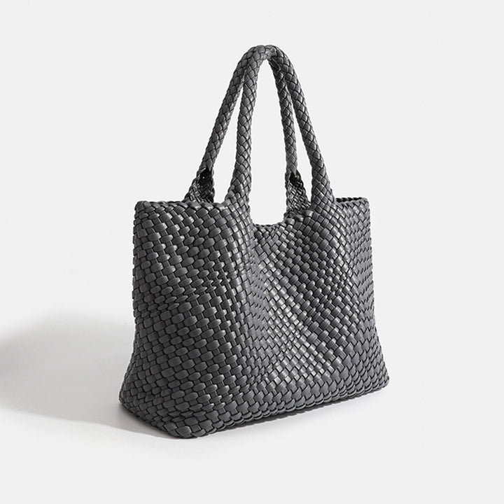 Handy women's large woven tote, a versatile shoulder bag and elegant daily carryall.
