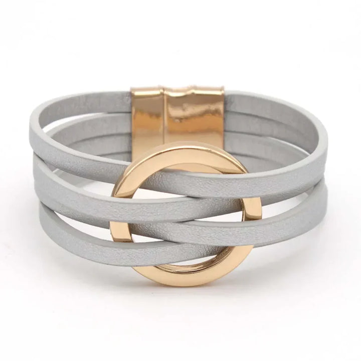 Adjustable women's leather wrap bracelet, multi-strand boho chic design with a delicate heart charm.