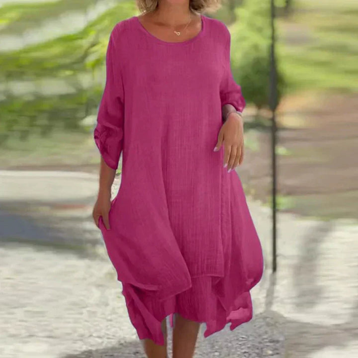 Women's layered midi dress with 3/4 sleeves, perfect for casual summer style. Relaxed fit & flowing design.