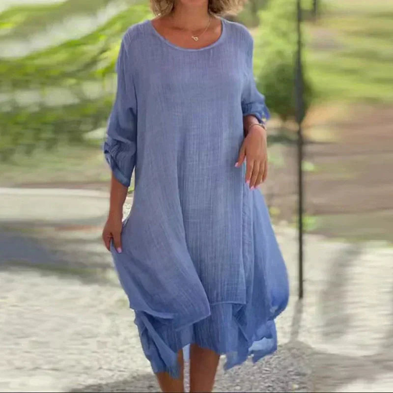 Women's relaxed fit layered midi dress, 3/4 sleeve, ideal for casual summer everyday wear. Flowing boho style.