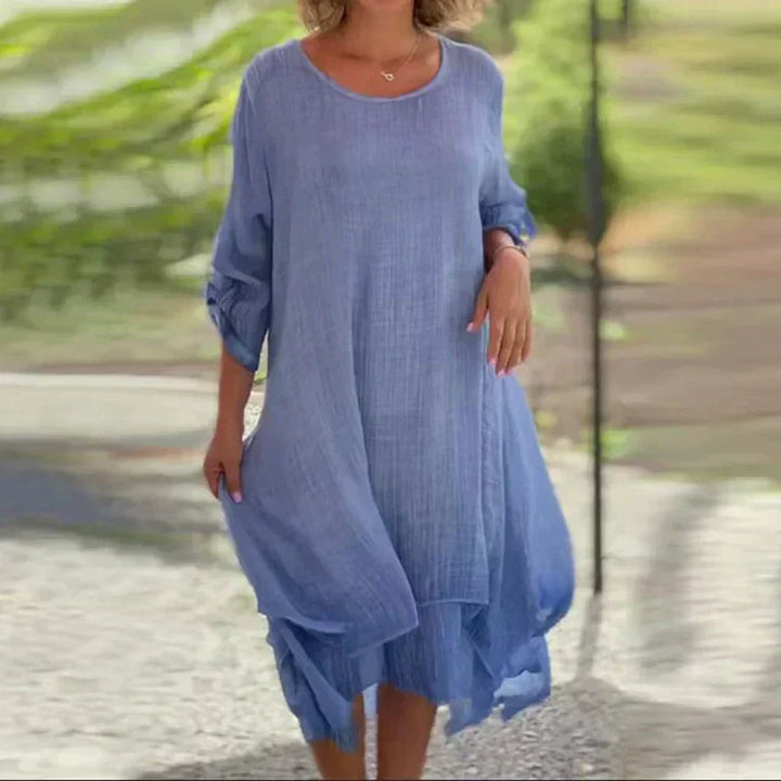 Women's relaxed fit layered midi dress, 3/4 sleeve, ideal for casual summer everyday wear. Flowing boho style.