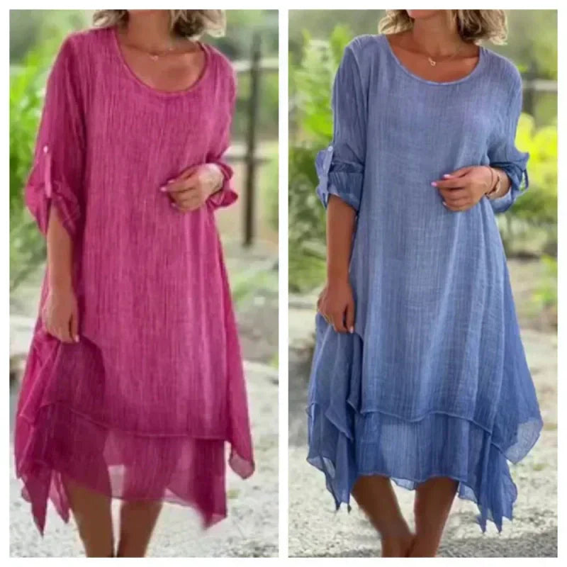 Everyday women's midi dress, layered with 3/4 sleeves, perfect for casual summer wear. Flowing, relaxed fit.