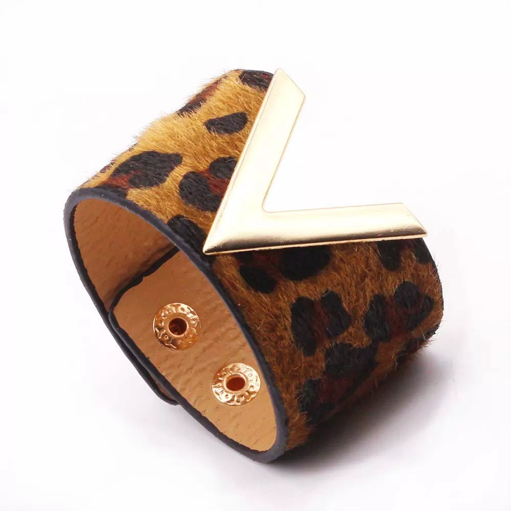 Adjustable women's leather wrap bracelet with bold leopard print