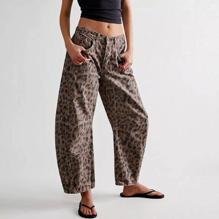 Stylish women's leopard print barrel jeans with a relaxed fit, mid-rise, and ankle length for casual wear.