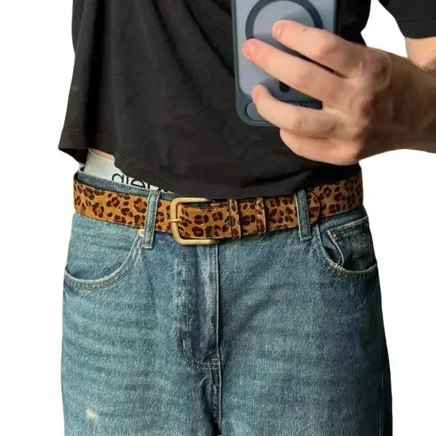 Women's leopard print suede belt, adjustable fashion accessory with an animal print design.