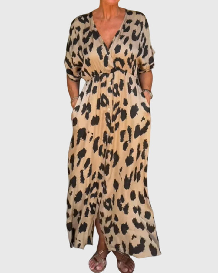 Women's leopard print v-neck maxi dress with button front & elastic waist, perfect for casual summer wear.