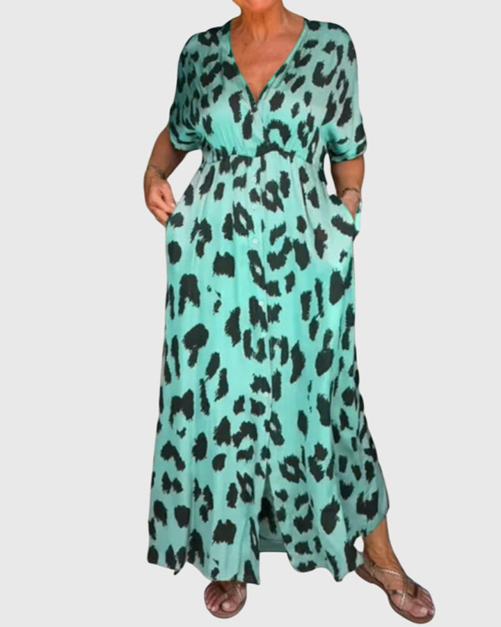 Elegant women's leopard print v-neck maxi dress featuring a stylish button-front and flattering flowy silhouette.