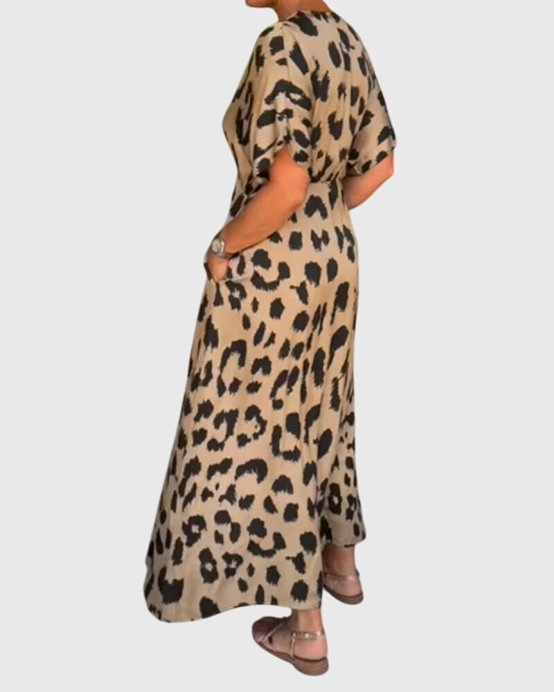 Versatile women's leopard print maxi dress, v-neck, button front, elastic waist. A stylish summer staple.