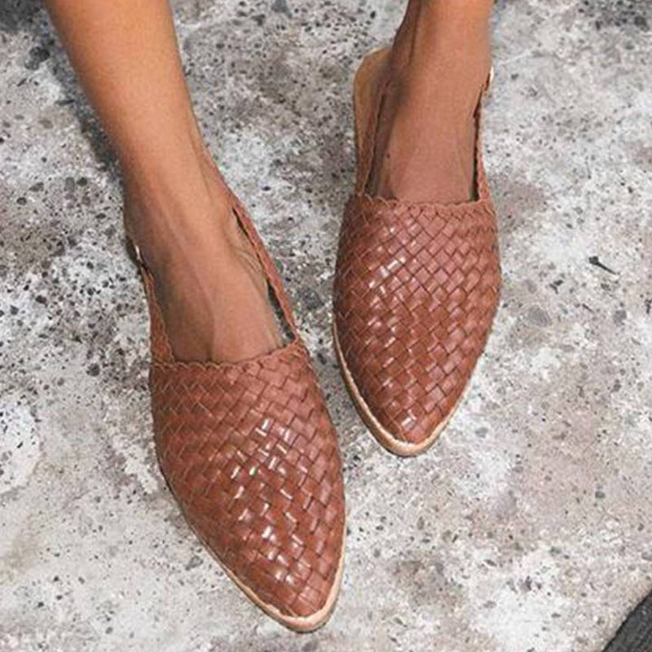 Casual women's Lia sandals featuring a chic braided design, almond toe, and comfortable slingback.