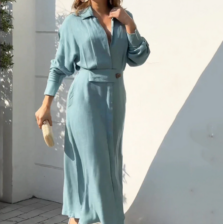 Light blue women's summer dress featuring a flattering waist tie and long sleeves, ideal for vacation or casual outings.