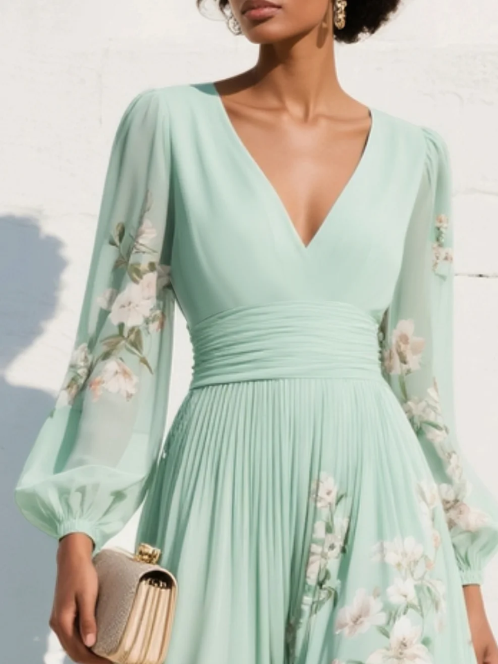 Comfortable women's light green floral midi dress with V-neck & pleats, a stylish choice for spring/summer fashion.