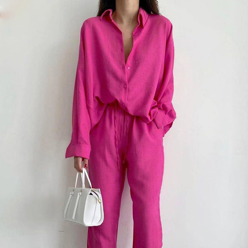 Comfortable women's light linen set: elegant blouse & wide-leg pants. Ideal for casual summer outfits.