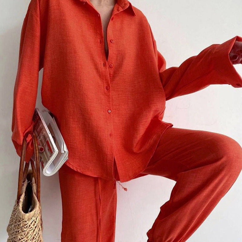 Stylish women's light linen blend summer set featuring a loose blouse & comfortable wide-leg pants.