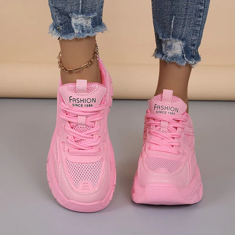Supportive women's athletic shoes, offering lightweight comfort for active lifestyles.