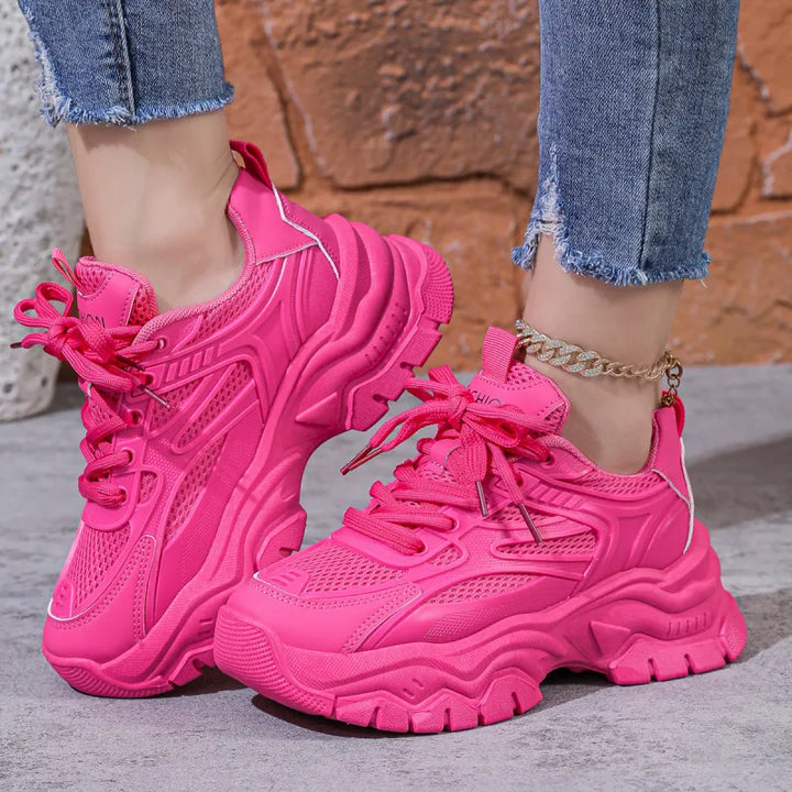 Modern women's activewear sneakers with a focus on lightweight design and superior comfort.
