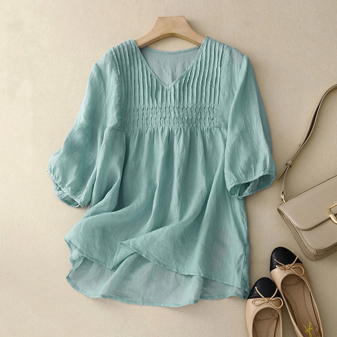 Relaxed fit women's casual top, breathable and lightweight for versatile everyday wear in spring/summer.