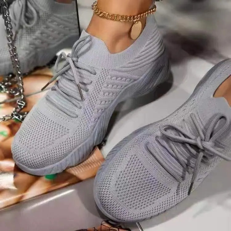 Ultimate comfort women's sneakers, lightweight, breathable mesh, non-slip grip for all-day wear.