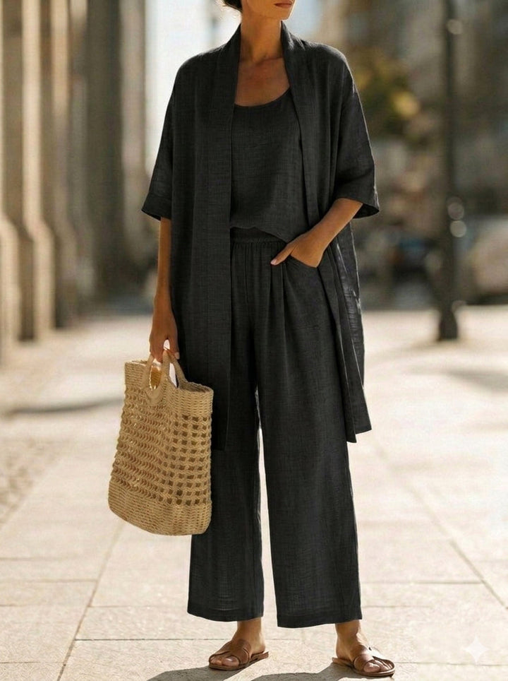 Woman in a casual women's three-piece summer outfit. Lightweight, breathable, elegant loungewear set.