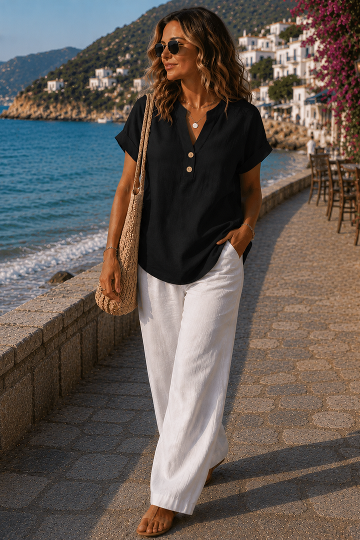 Women's lightweight button-detail shirt for effortless style, a versatile blouse for casual or office wear.