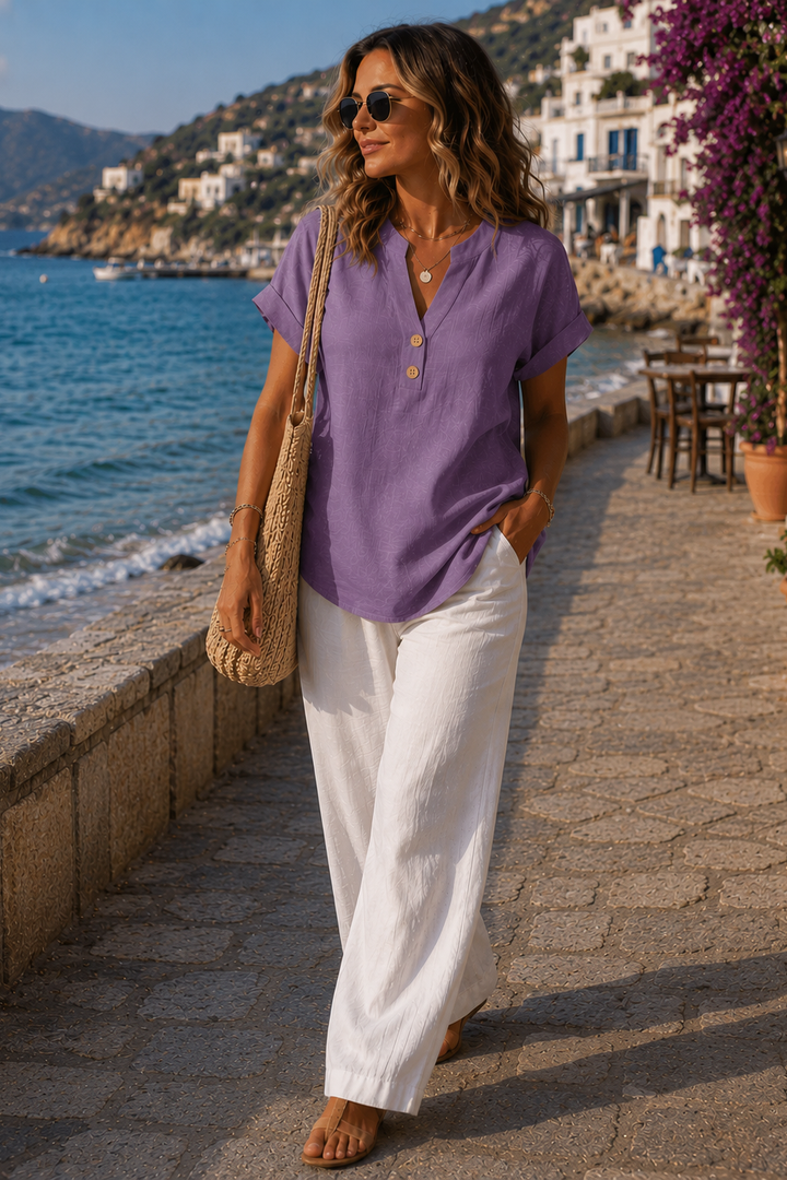 Breathable summer top: women's lightweight button-detail shirt for warm weather and relaxed style.