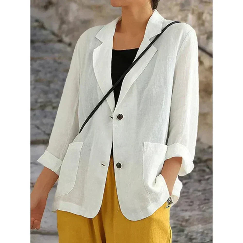 Button-up women's cardigan in a lightweight fabric, designed for versatile layering and travel fashion. Effortless casual style.