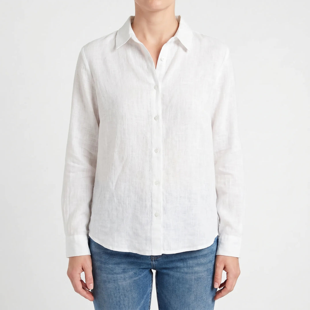 Woman wearing a relaxed fit lightweight casual summer blouse, perfect for warm weather.