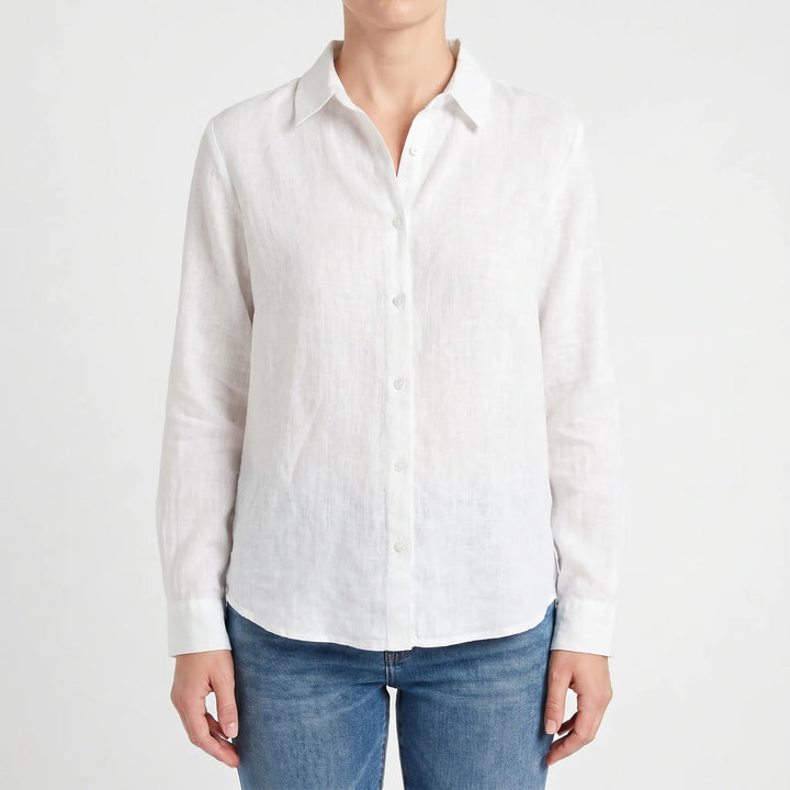 Woman wearing a relaxed fit lightweight casual summer blouse, perfect for warm weather.