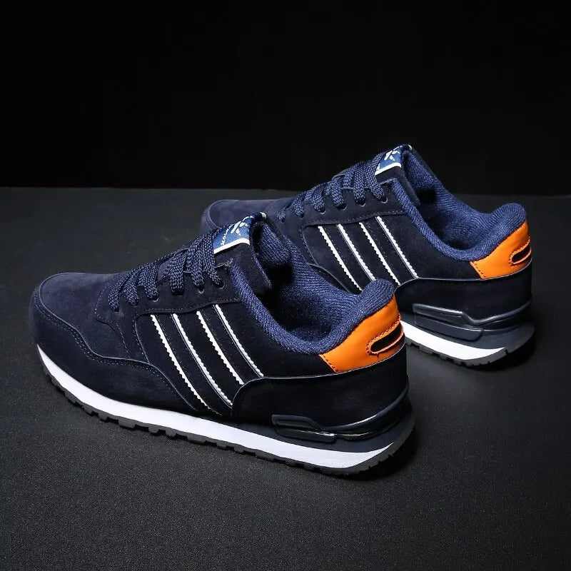 Gray women's lightweight athletic sneakers, designed for walking and casual all-day wear.