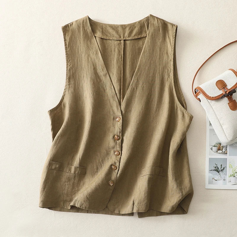 Close-up of a women's lightweight cotton-linen button-front vest, highlighting breathable fabric texture.