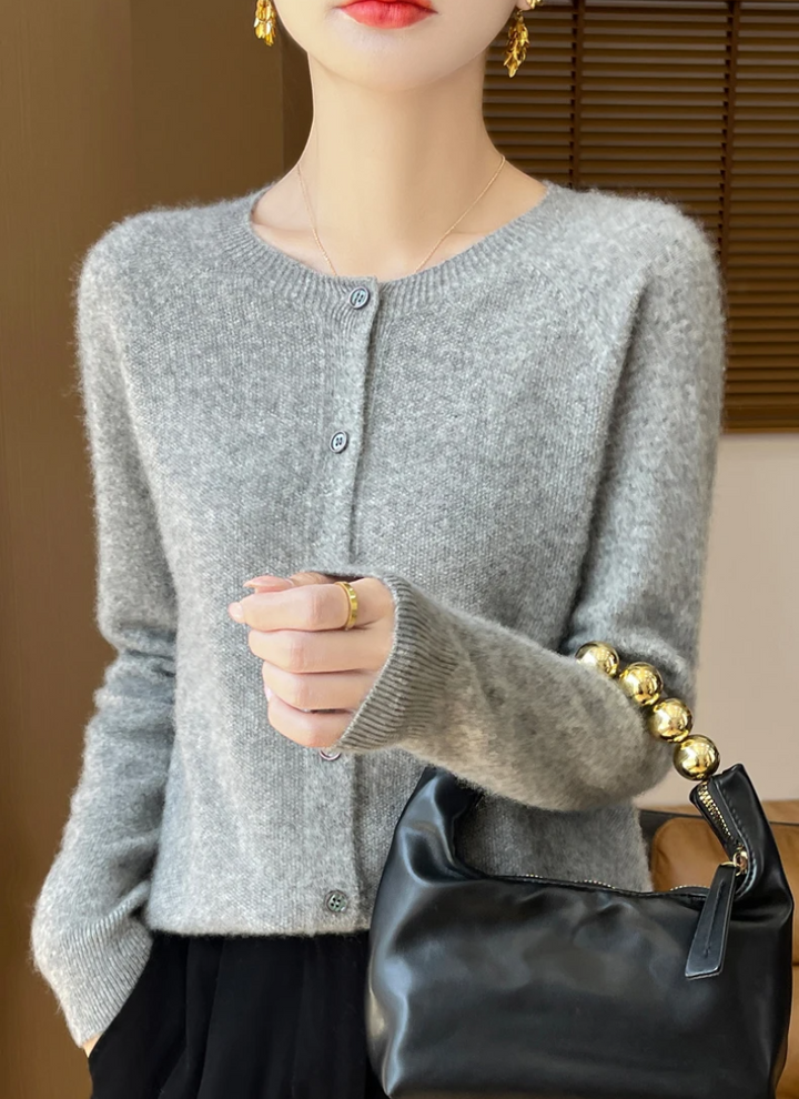 Women's crew neck button-down cardigan. A lightweight, elegant long sleeve top, great for fall layering.