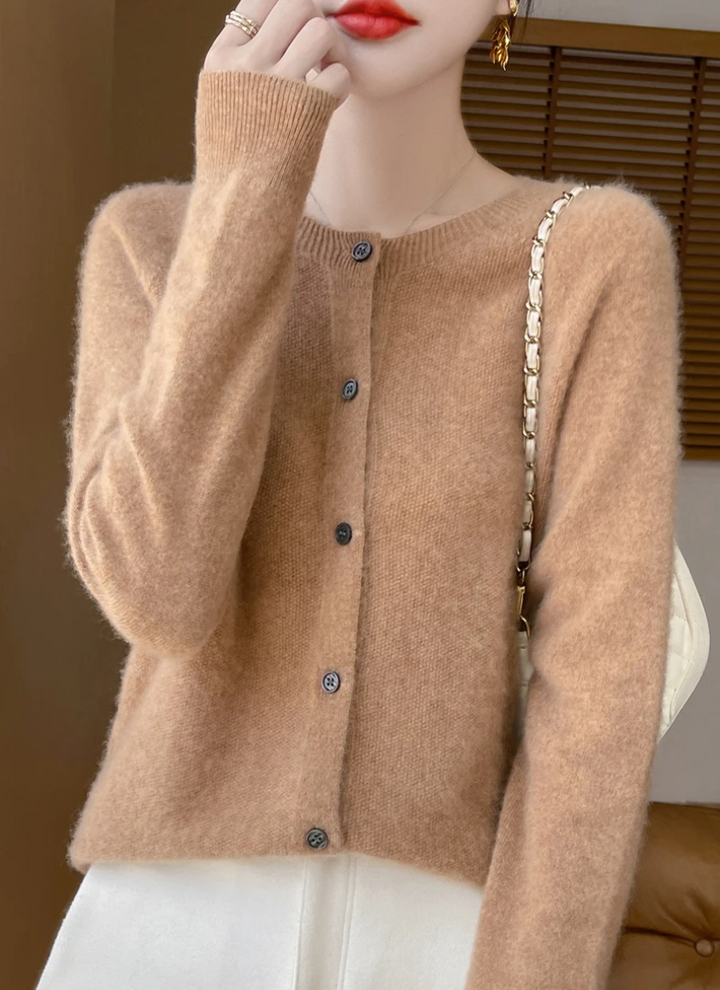 Women's apparel: Lightweight long sleeve cardigan. Cozy, versatile layering piece for all-season comfort.