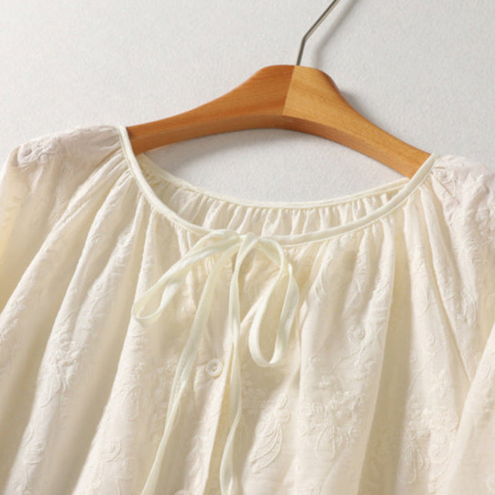 Stylish women's embroidered top. Lightweight, comfortable blouse with delicate scalloped details, ideal for summer.