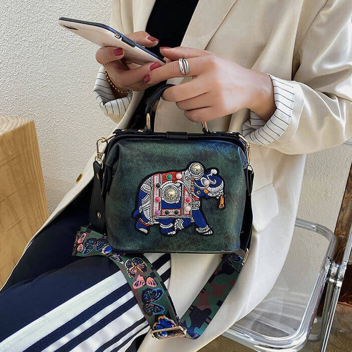 Multi-use bohemian mandala bag for women. Lightweight PU coated cotton with vibrant embroidery.