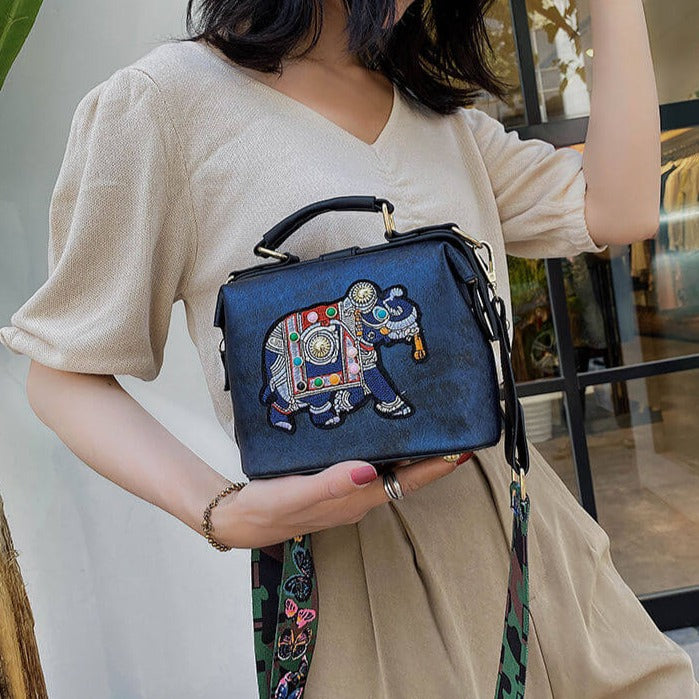 Elegant women's embroidered mandala shoulder bag. Lightweight, artistic, and bohemian design.