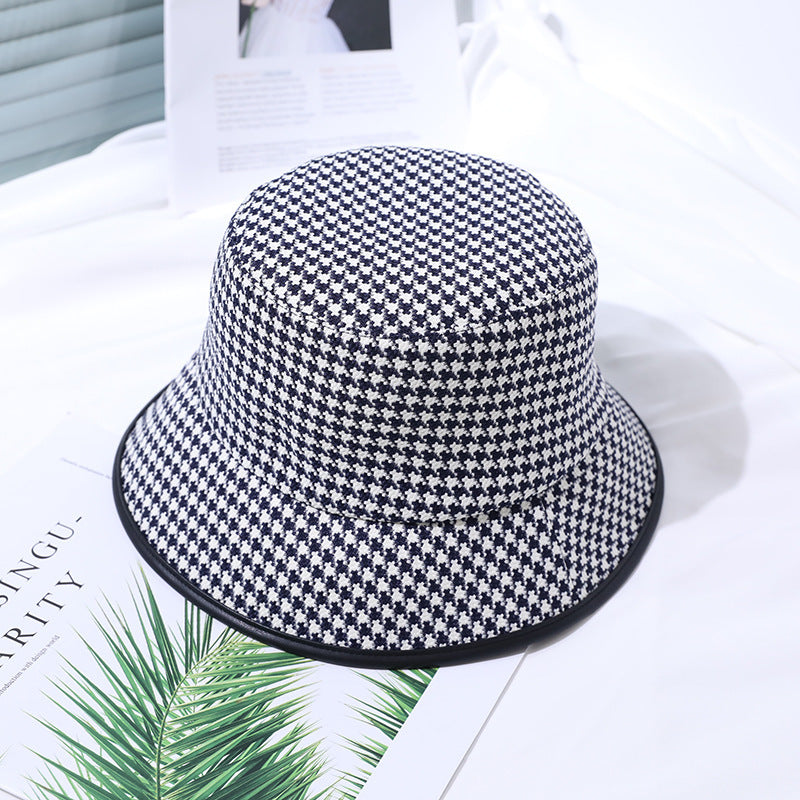 Lightweight fabric bucket hat for women in coffee and black, a must-have summer fashion and sun protection item.