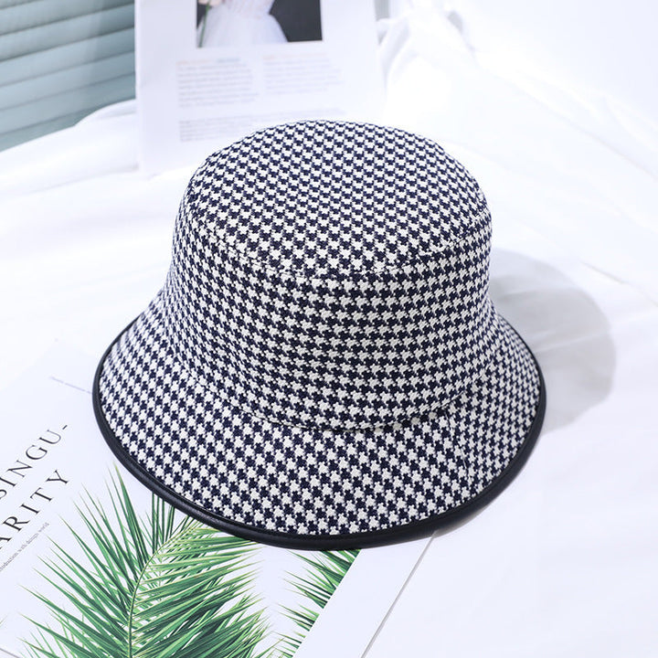 Lightweight fabric bucket hat for women in coffee and black, a must-have summer fashion and sun protection item.